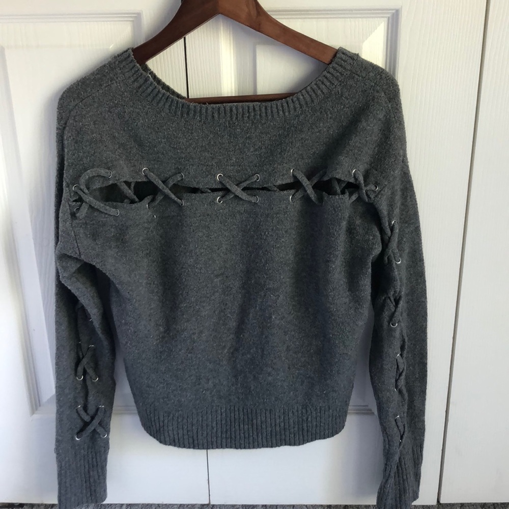 Grey garage sweater with lace up on the back